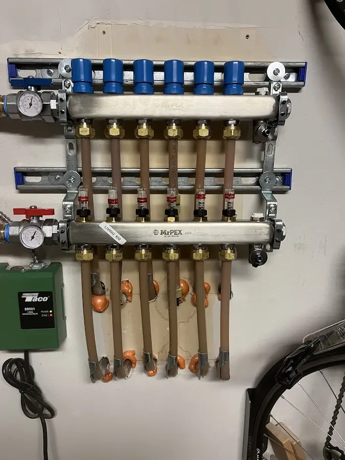 Plumber performing Gas Line Installation at a residential property in McDonough